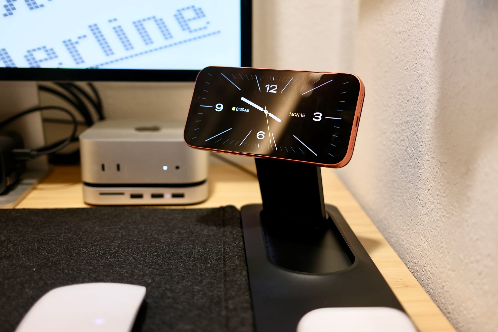 Yes, this desk mat has an adjustable wireless charging stand and it's as cool as it seems
